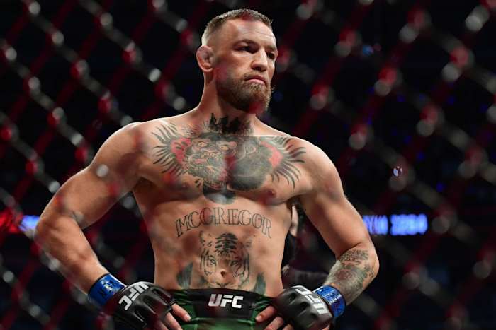 Conor McGregor enters the Octagon for his trilogy fight against Dustin Poirier at UFC 264.